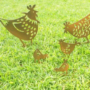 Funky Chickens Garden Stake featuring two laser-cut hens and three chicks made from Corten steel. Dimensions: Hen 28x36cm, Hen 23x35cm, Chick 12x18cm, Chicks 11x15cm. Perfect for adding whimsy to gardens.