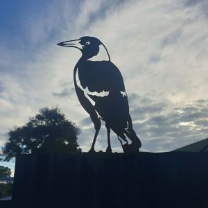 Magpie standing post topper – Australian-made rusted metal garden art crafted from Corten steel, featuring a natural rusted finish for outdoor decor.