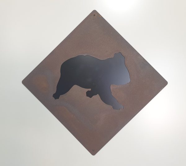 Koala road sign made from 1.6mm thick Corten steel, 63 cm square, naturally rusting for a rustic finish. Hand-crafted in Adelaide, Australia, ideal for outdoor garden decor.