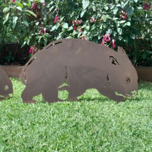 Lifelike rusted metal Wombat Garden Stake measuring 60cm x 42cm, made from Corten steel with a rustic patina for outdoor garden décor.